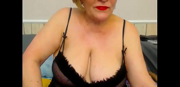  Granny shows off her huge tits